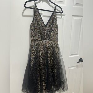 Dress the population knee length tool and sequin dress
